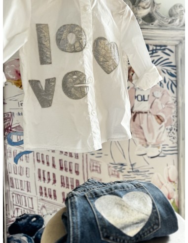 Jeans tasca a cuore argento