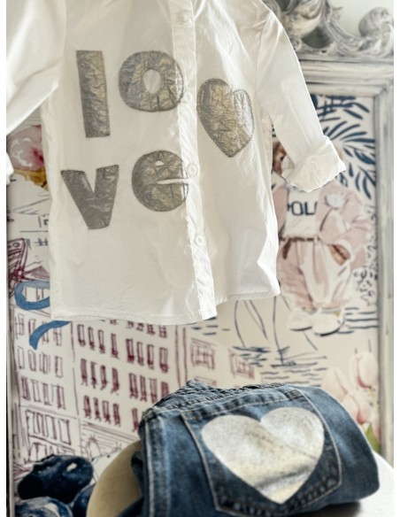 Jeans tasca a cuore argento