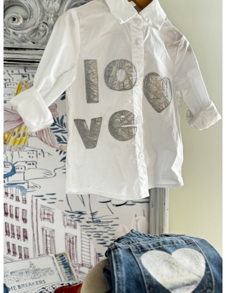 Jeans tasca a cuore argento
